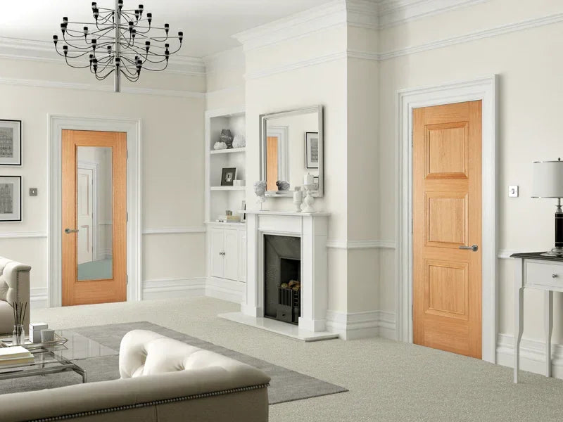 Oak interior doors in modern living room with white walls, fireplace and chandelier