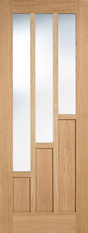 Oak glazed internal door with three vertical frosted glass panels and modern wood design