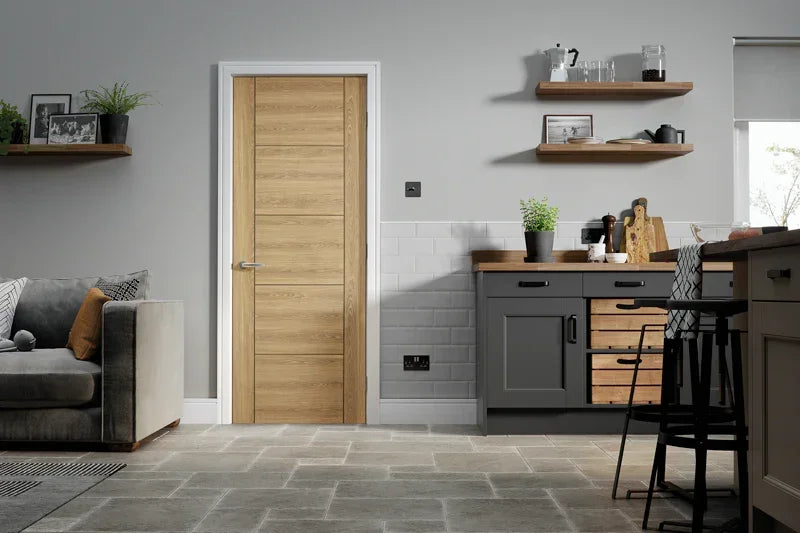 Oak laminated interior door with horizontal panels in modern kitchen living room setting