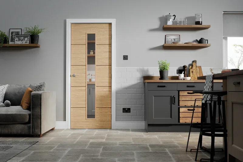 Oak Lille glazed internal door with vertical glass panel in modern kitchen living space
