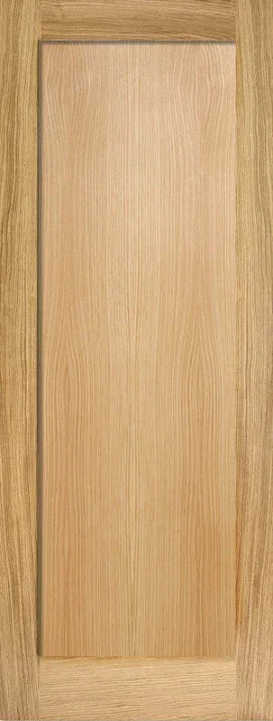 Oak internal door with one vertical panel and natural wood grain finish