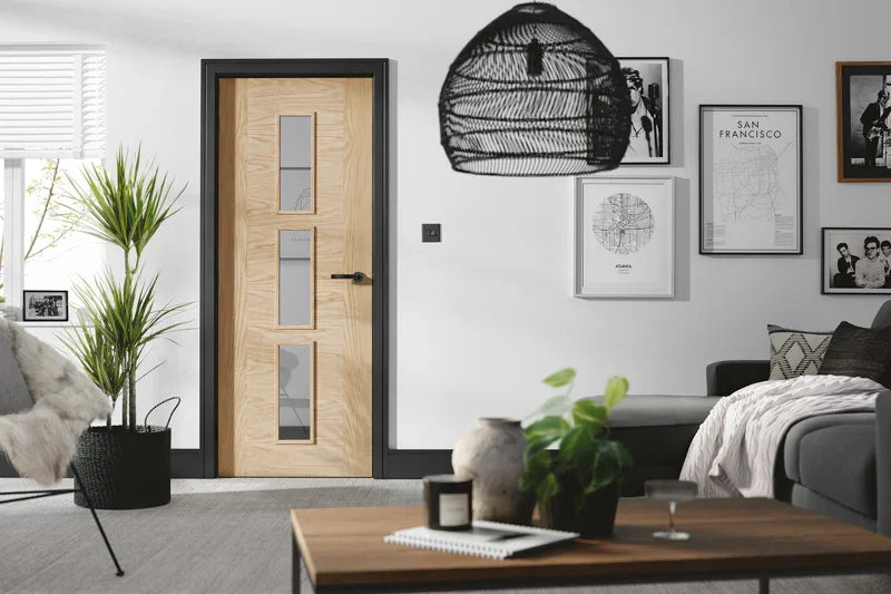 Oak Sofia Glazed 3L interior door with three glass panels in modern living room