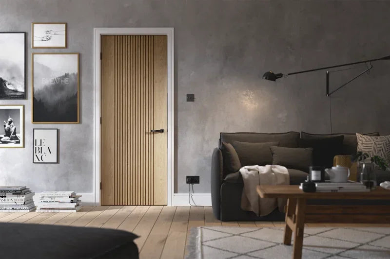 Oak Sydney pre-finished door with vertical groove detail in modern living room setting