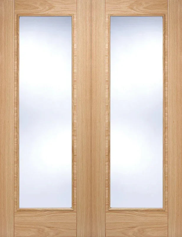 Oak glazed door pair with large vertical clear glass panels and natural wood finish