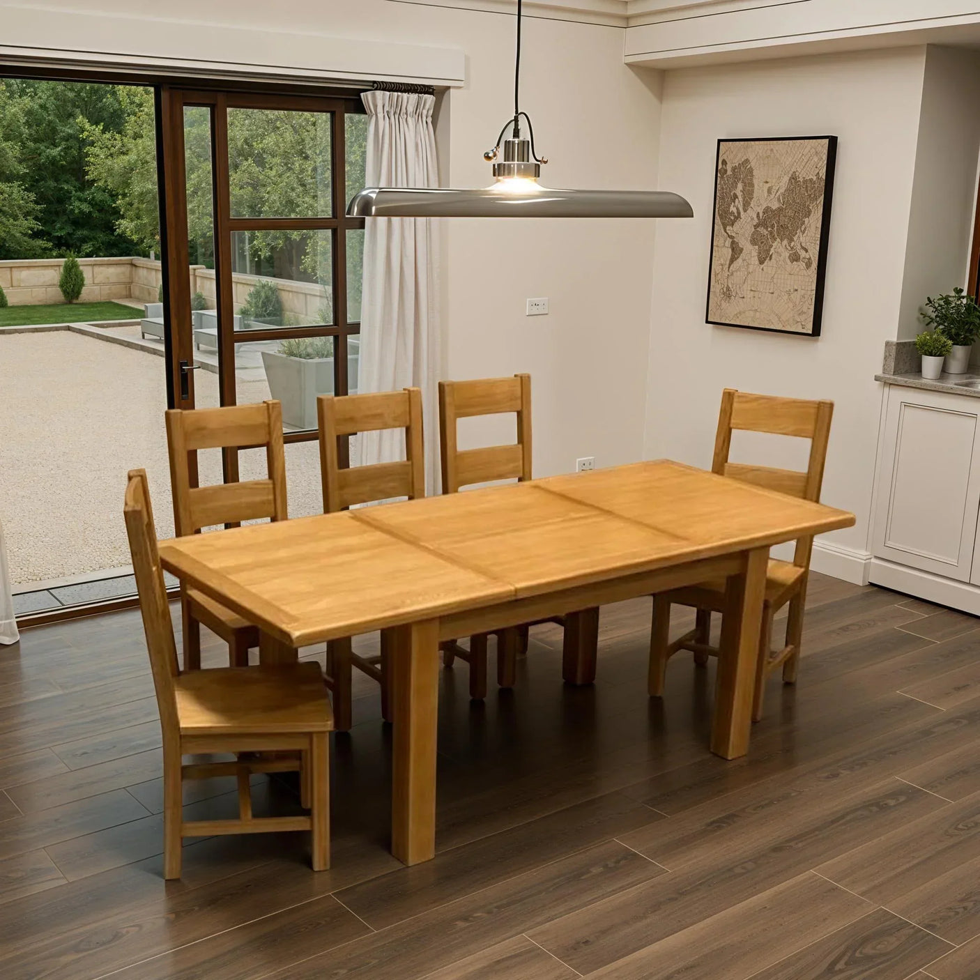 Oak dining table set with six chairs in modern dining room with wood flooring