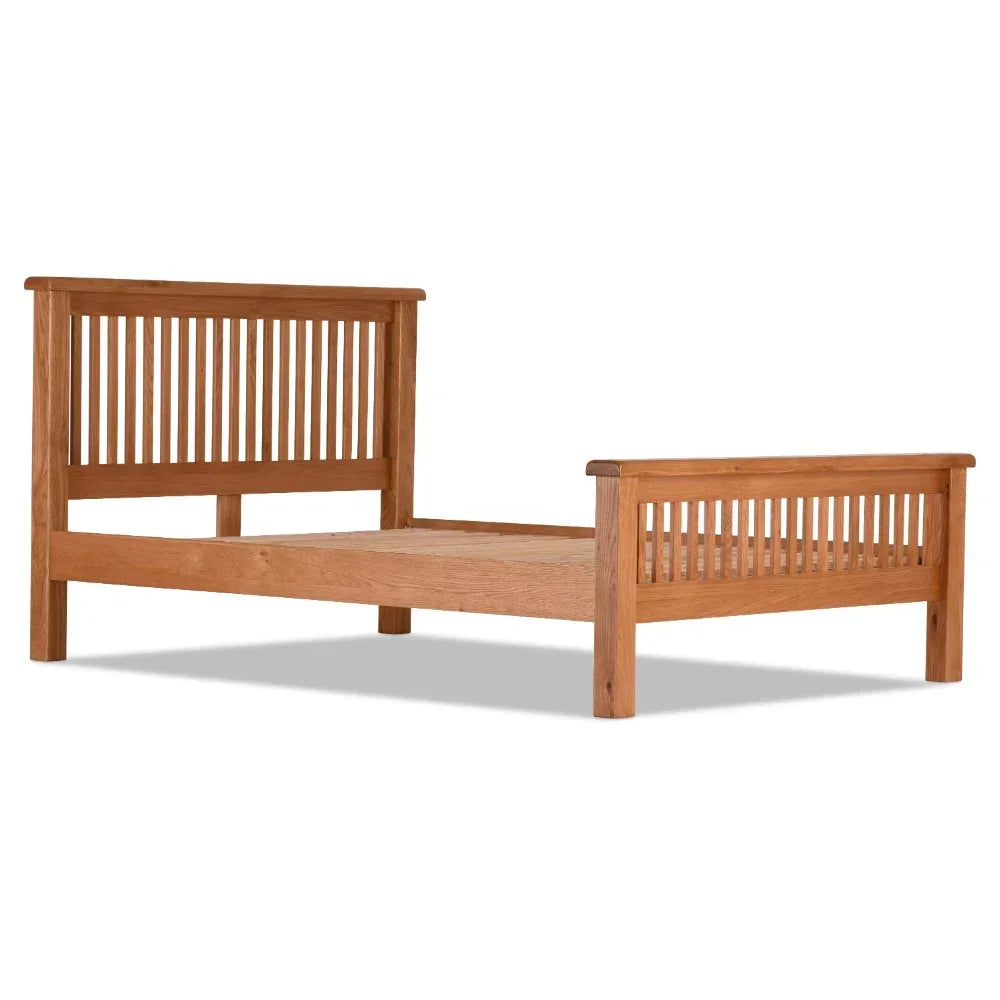 4ft6 wooden bed frame with slatted headboard and footboard, oak finish