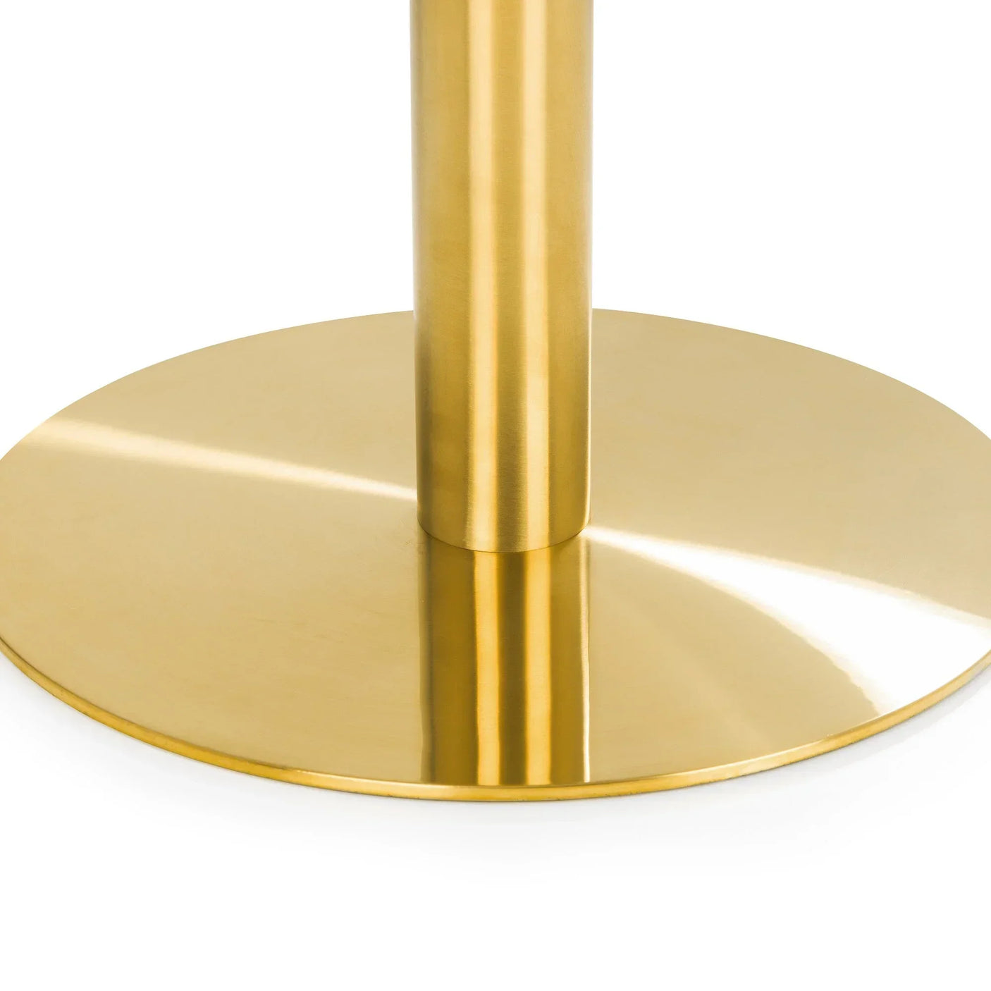 Brushed gold metal table base with round flat bottom, modern furniture detail