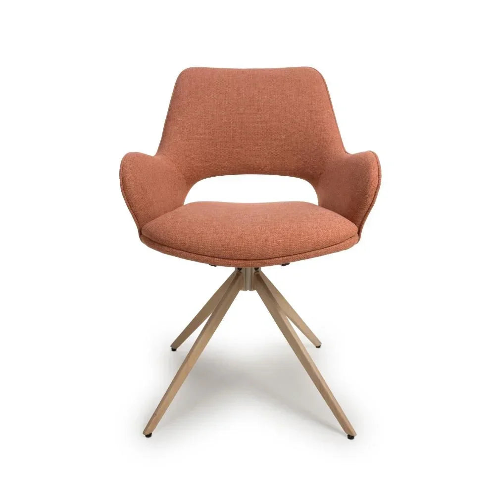 Rust fabric dining chair with curved backrest and wooden tripod base, front view