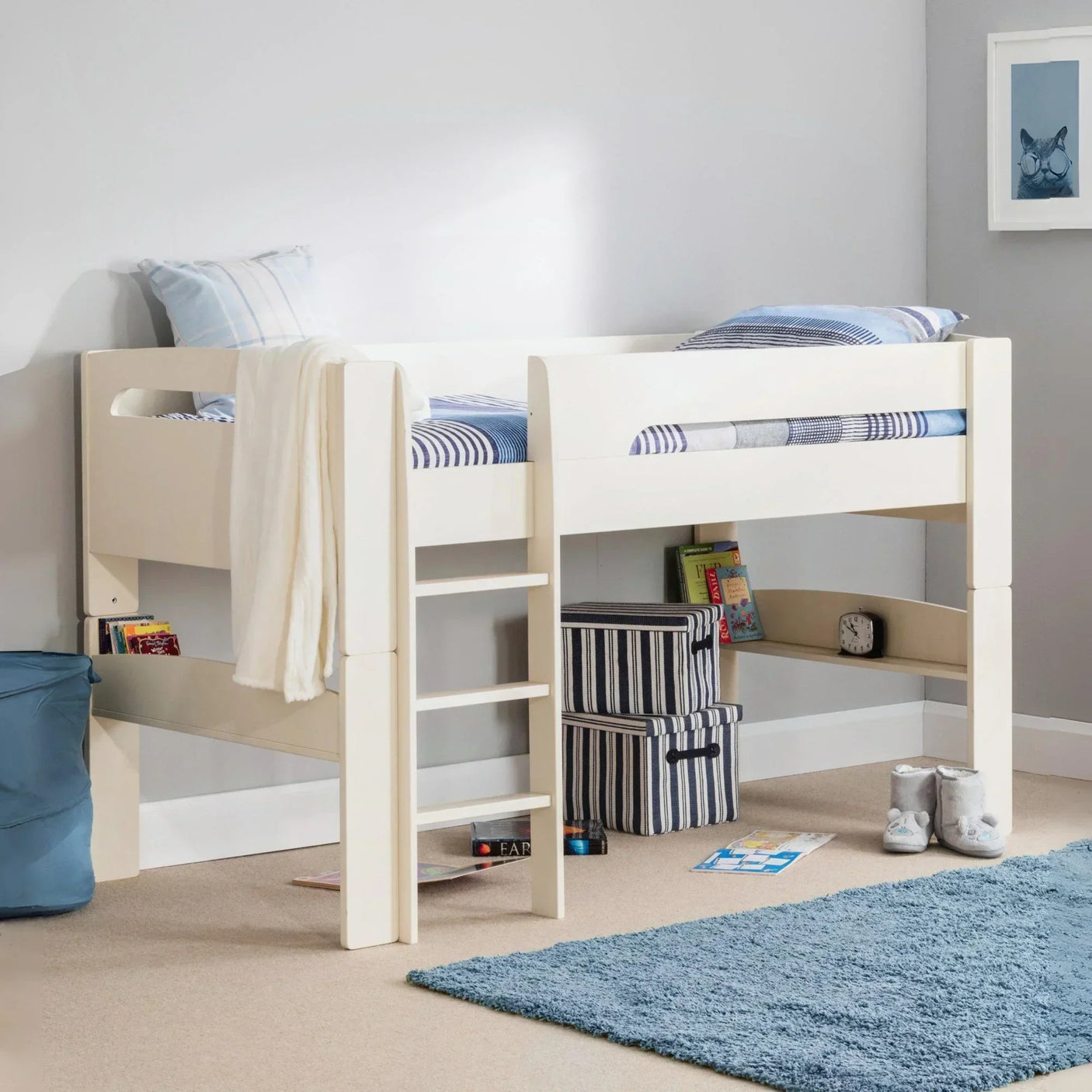 Cream wooden kids mid sleeper bed with ladder, underbed storage, striped bedding