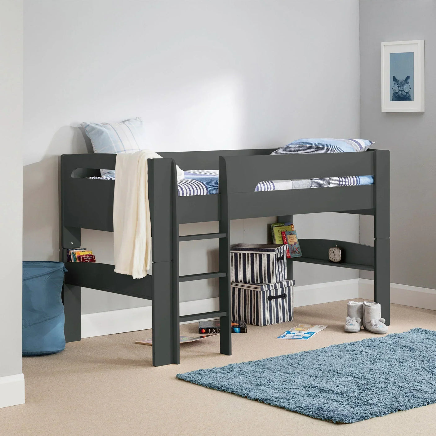 Anthracite midsleeper bed with ladder in modern kids room, striped storage boxes below