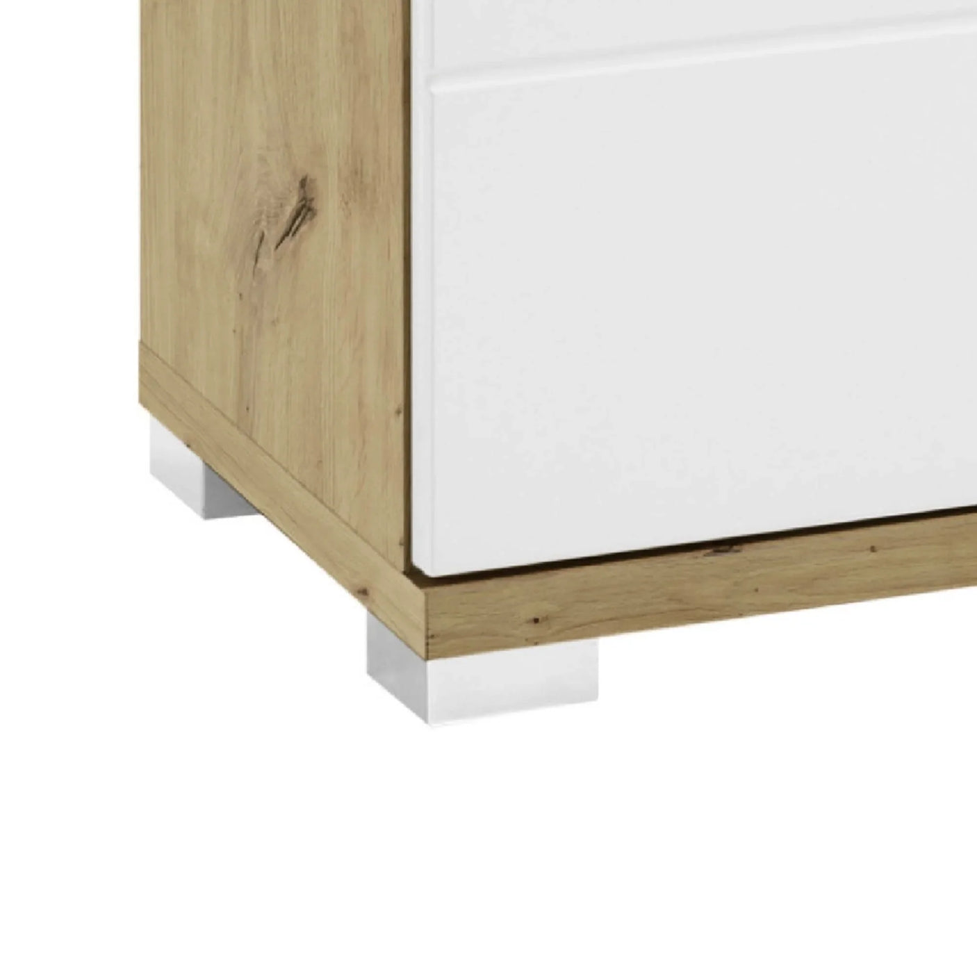 Close view of wooden bedside cabinet corner with white drawer front and chrome leg