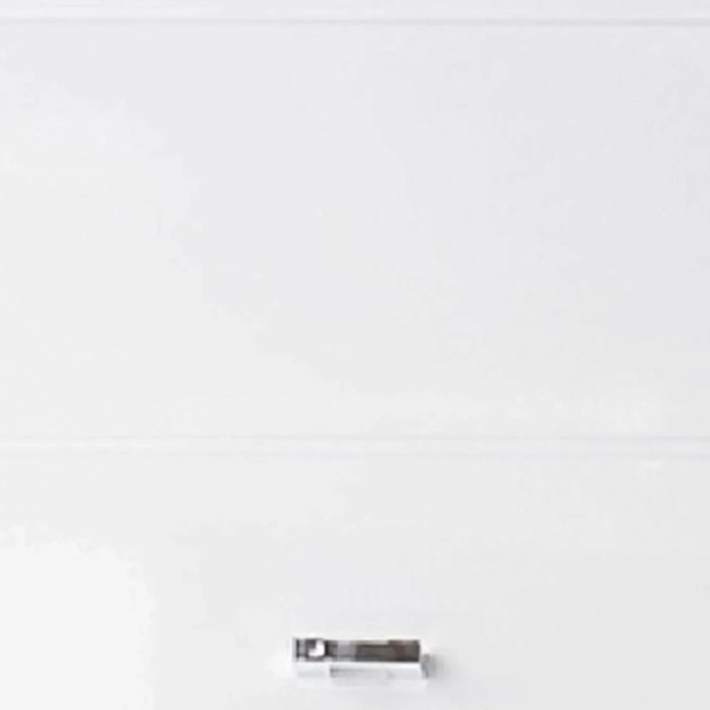 Gloss white drawer front with modern chrome handle for bedroom furniture