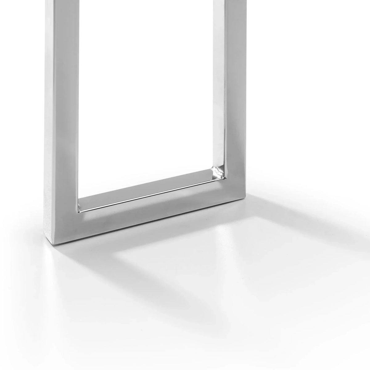 Chrome metal table leg with rectangular frame detail on white background