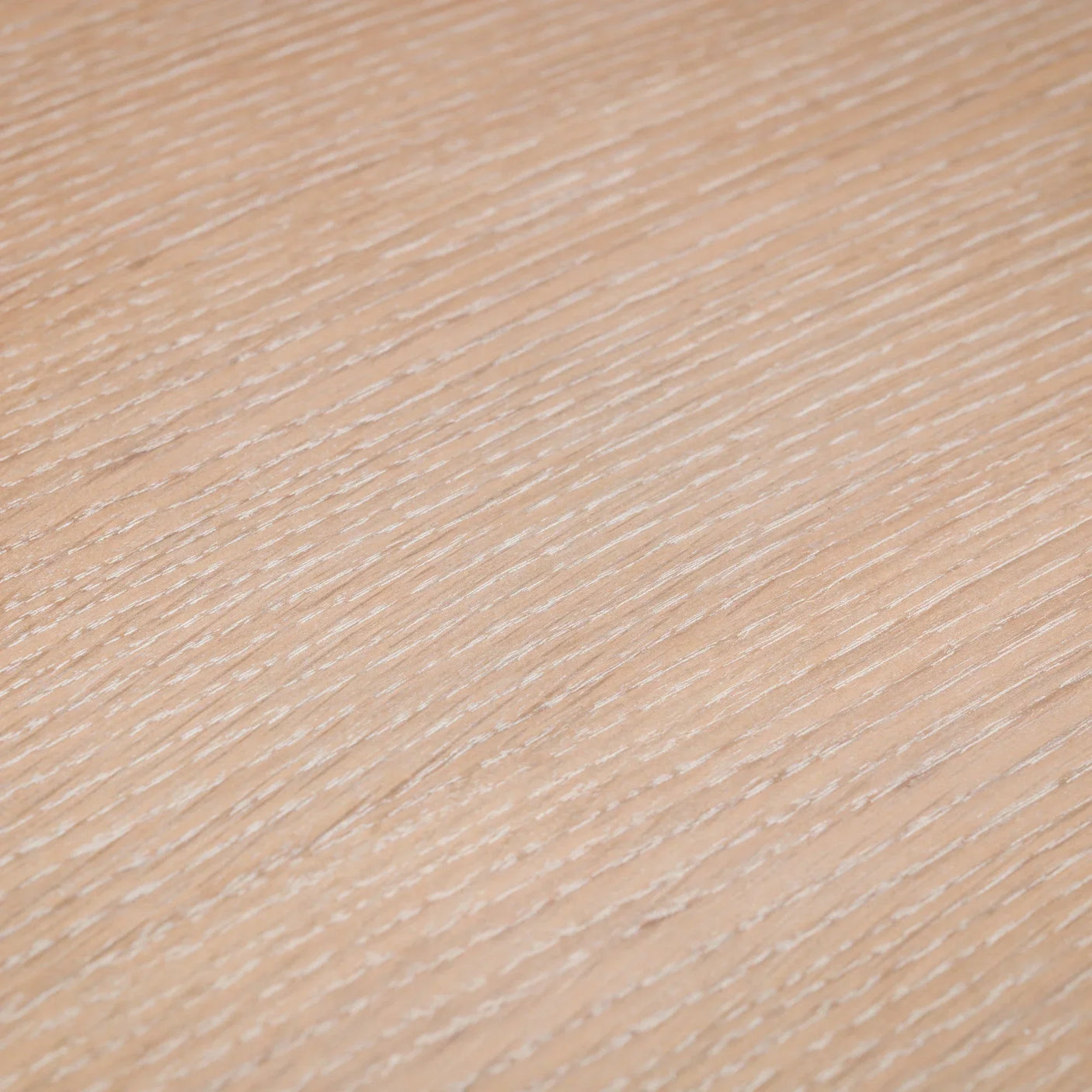 Closeup of light oak wood grain texture on furniture surface