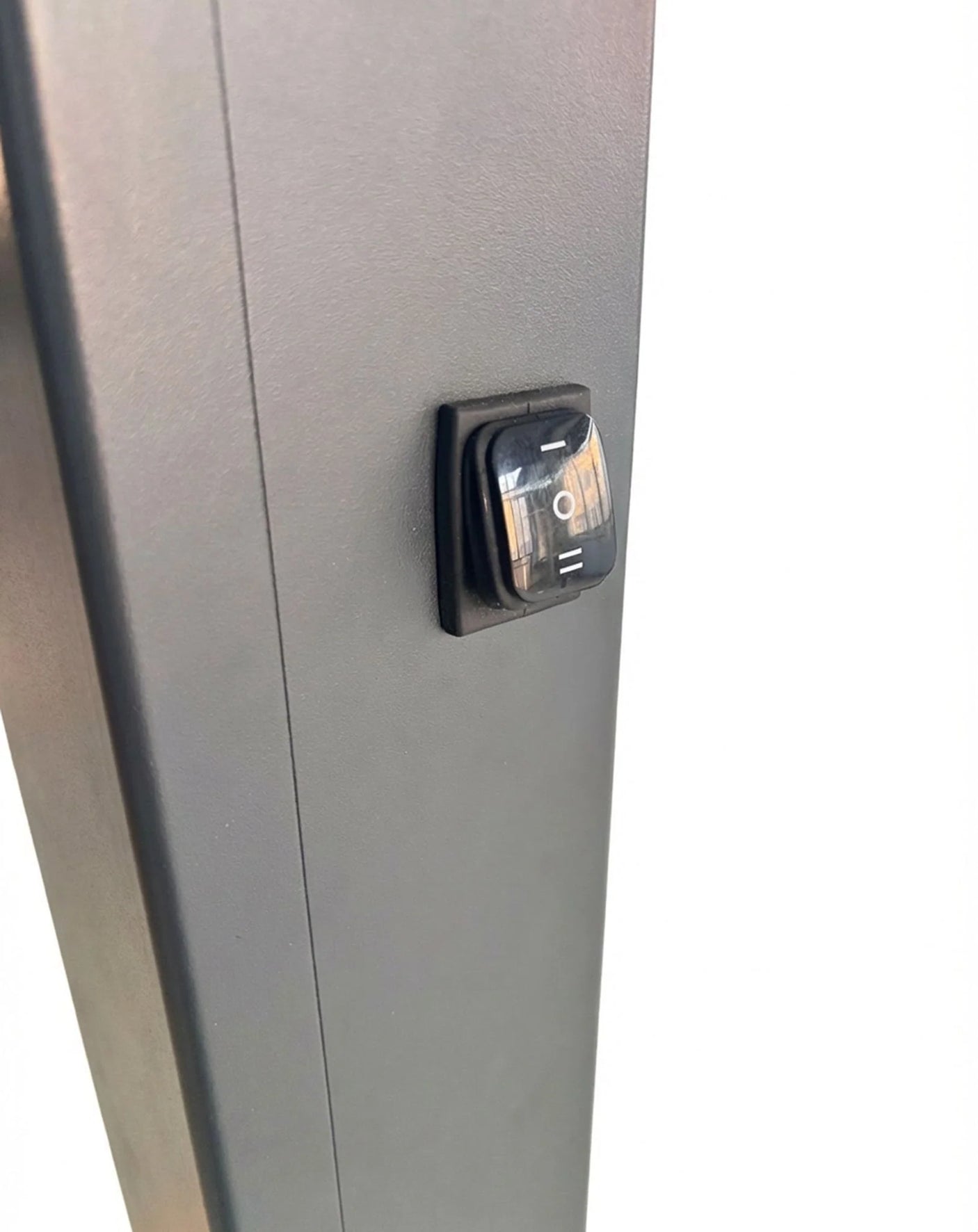 Metallic surface with a rectangular switch or sensor