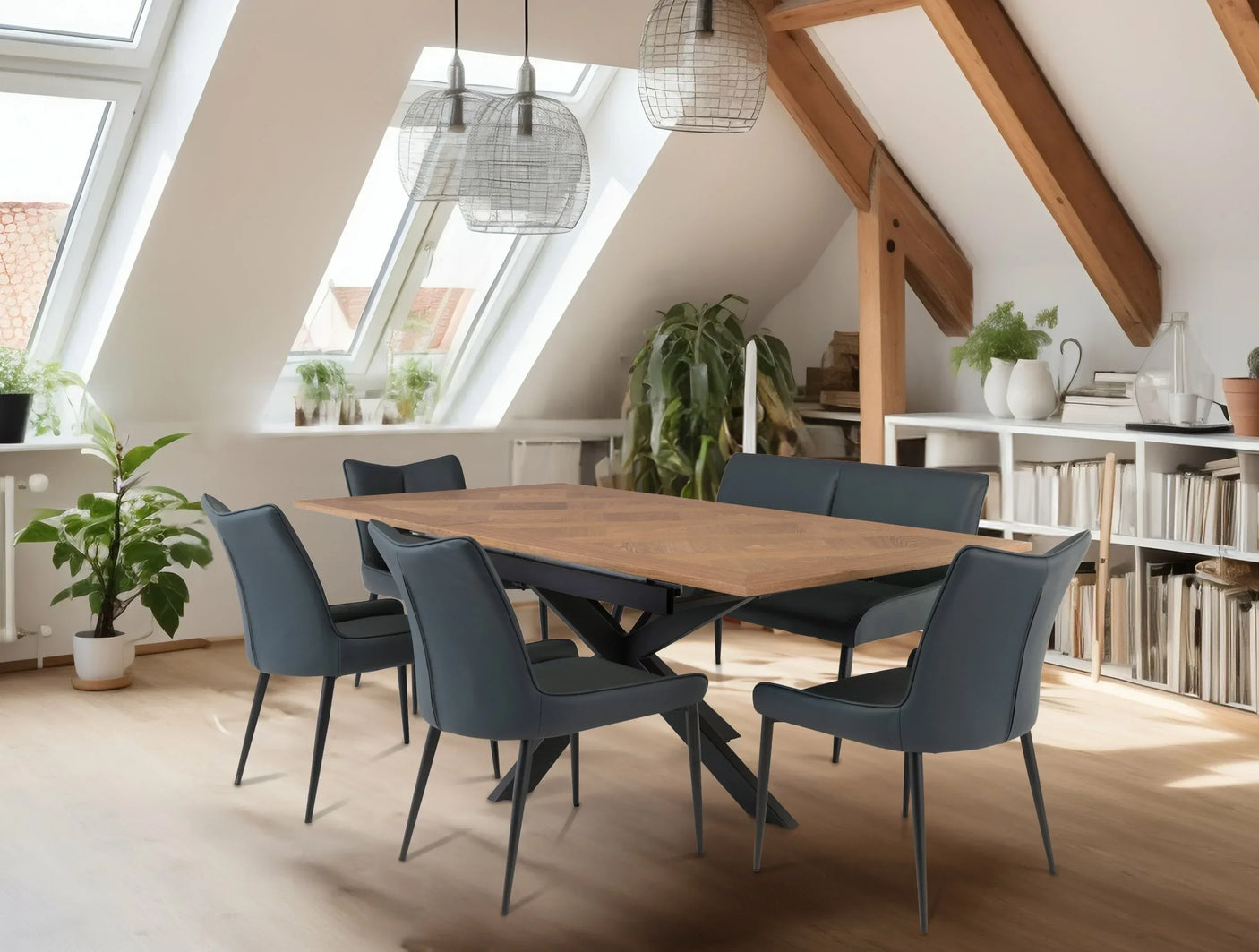 wood dining table with six dark chairs in modern loft room with skylights and plants