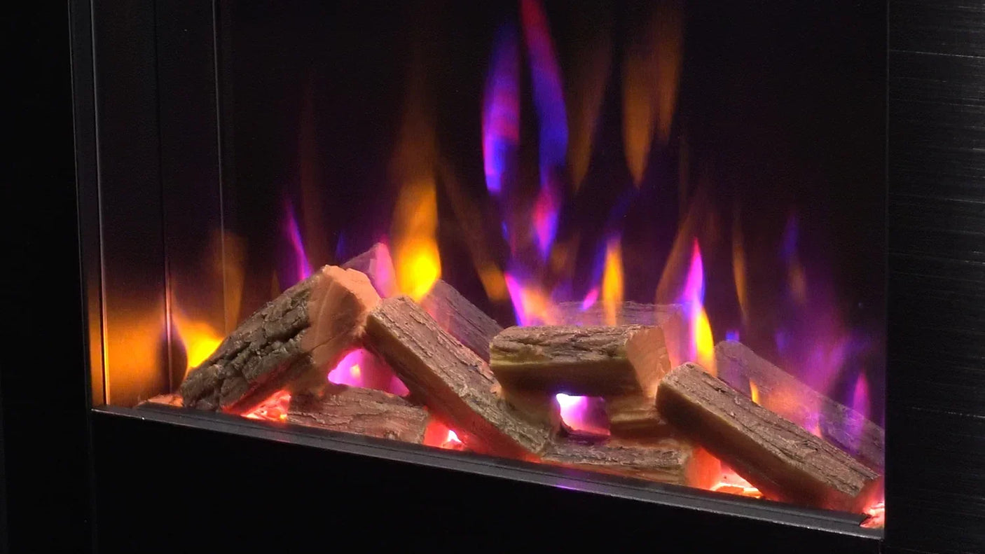 Electric fireplace with realistic log set and purple flame effect