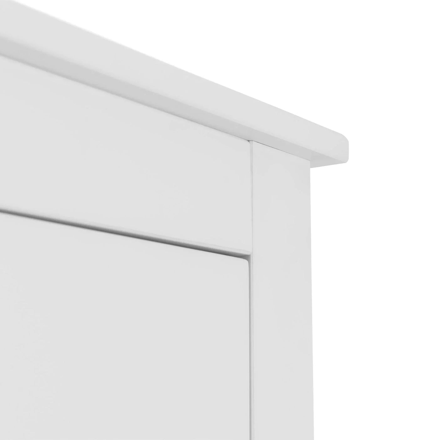 Close view of white wooden wardrobe panel and corner with smooth painted finish