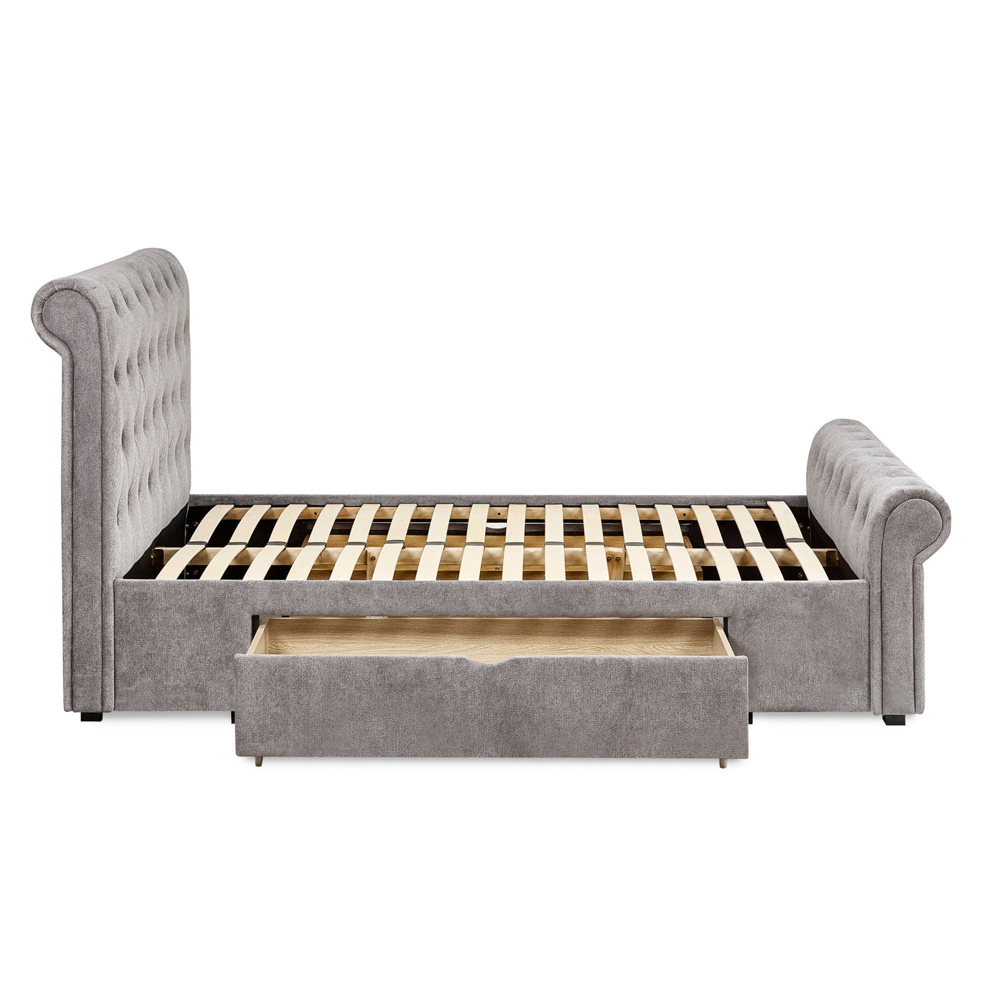 Side view of grey fabric storage bed with slatted base and one drawer partially open