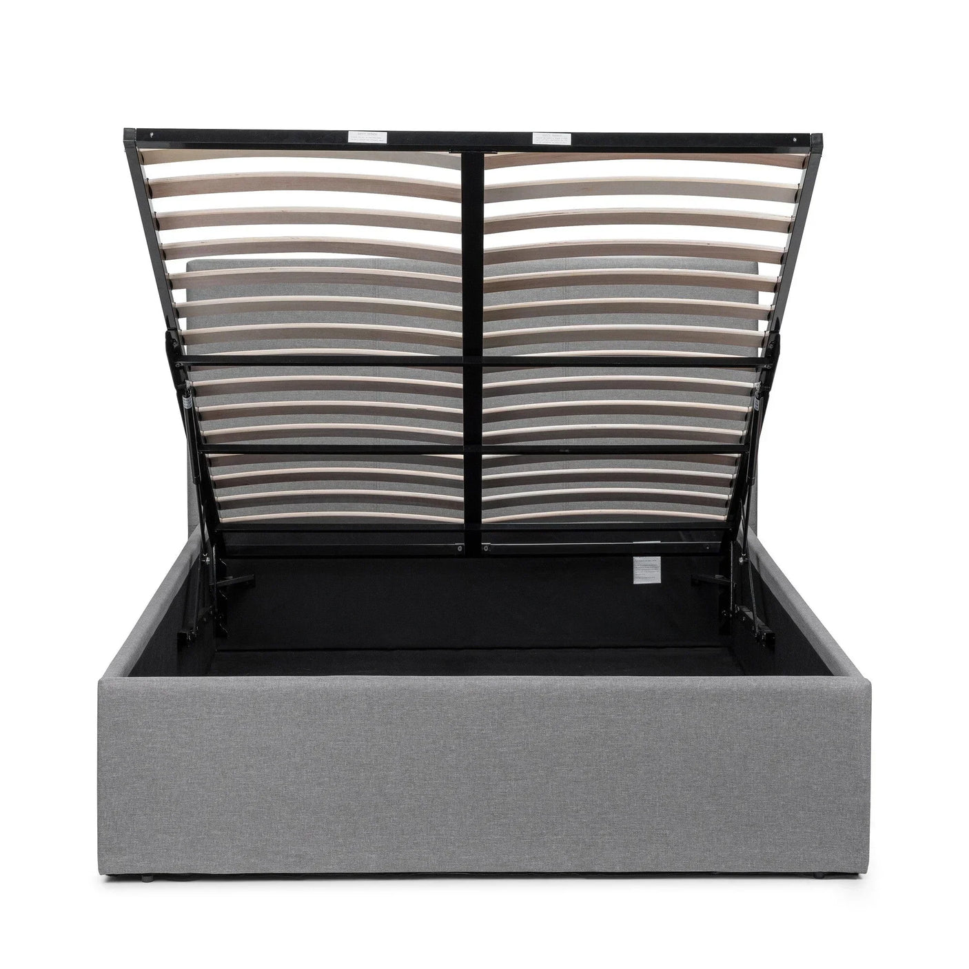 Grey lift-up storage bed with open slatted base showing under-bed storage compartment