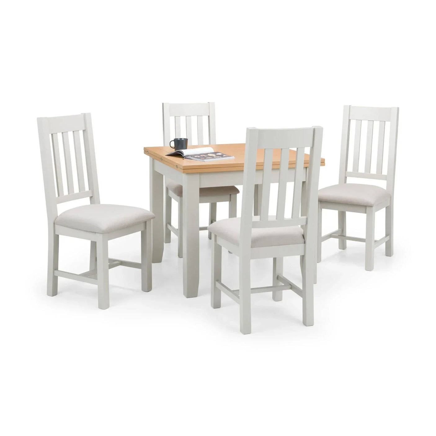 Light wood dining table with four white slatted back chairs and cushioned seats