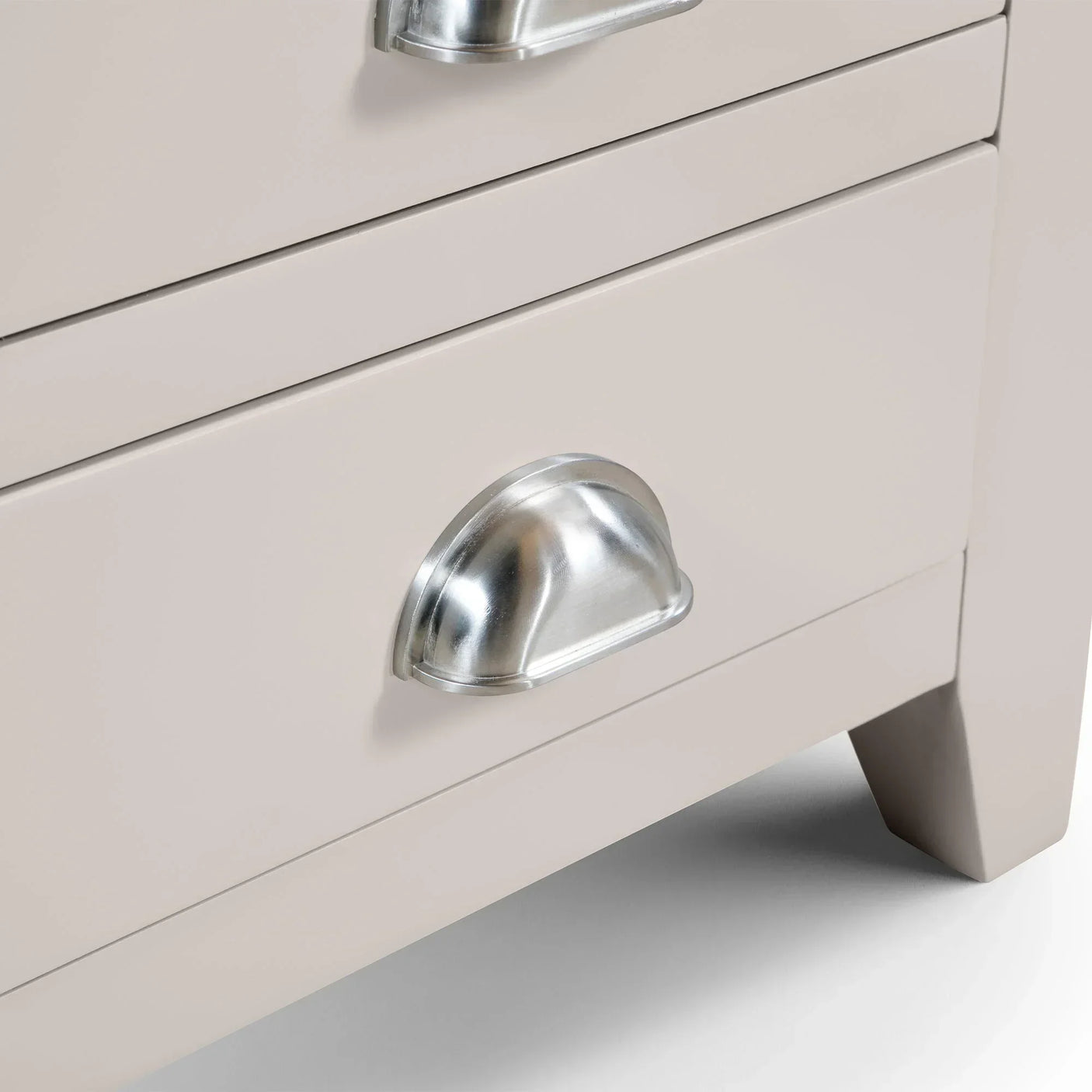 Richmond twin pedestal dressing table drawer with brushed metal cup handle, close-up view