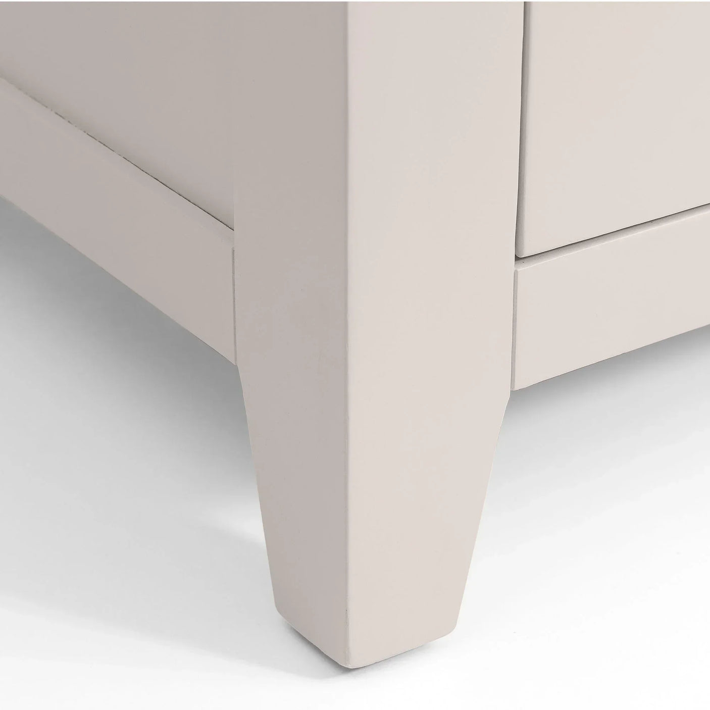 Close view of Richmond twin pedestal dressing table leg with smooth painted wood finish