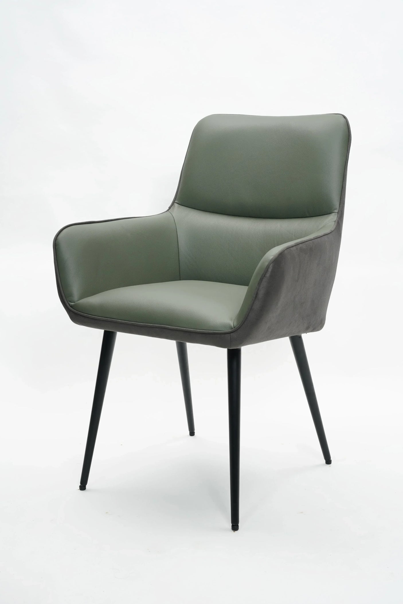 Rebecca dining chair in basil green leather with black tapered legs, front angle view