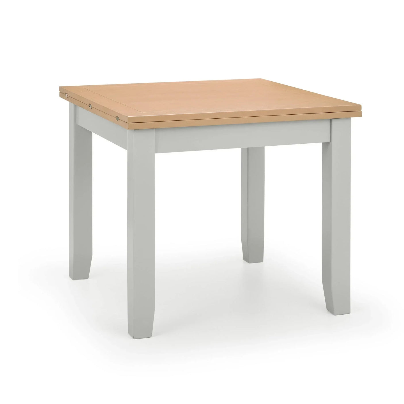 Closed flip-top dining table with light wood top and white legs on white background
