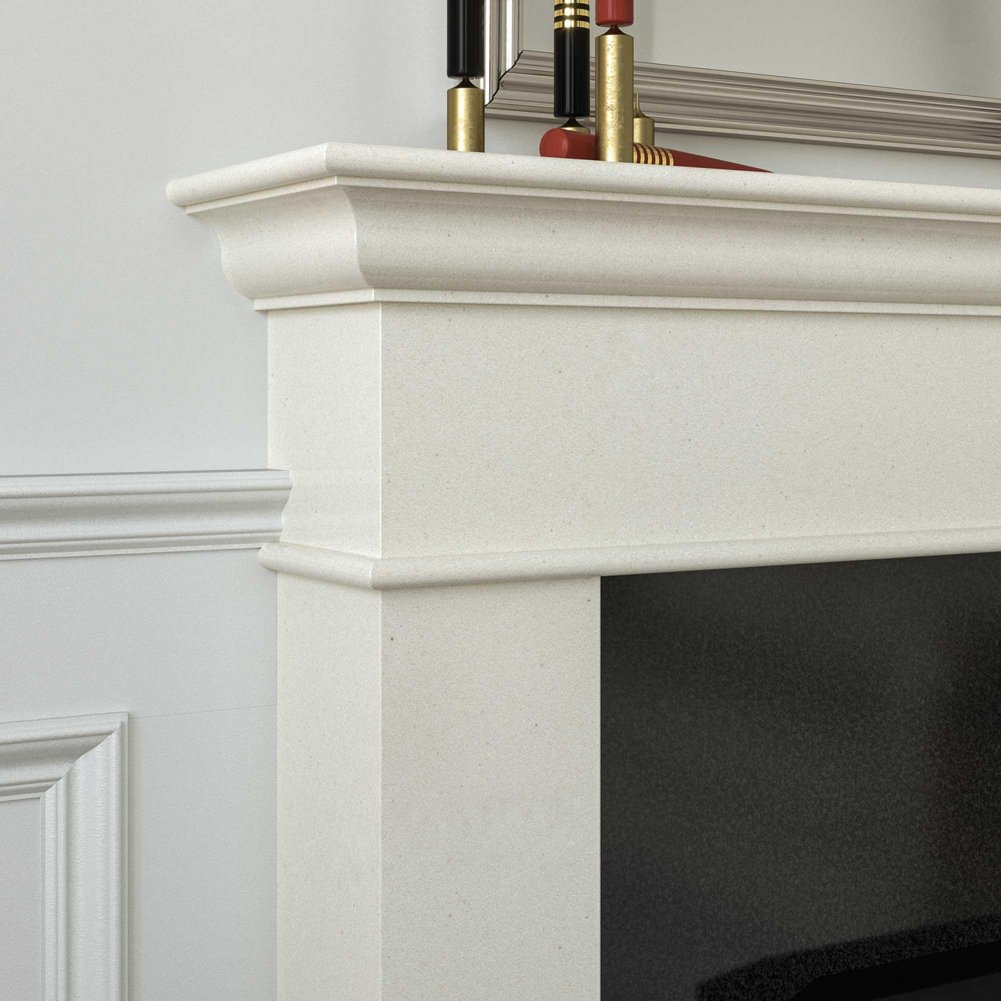 Beige stone fireplace surround with mantel shelf in a modern living room setting