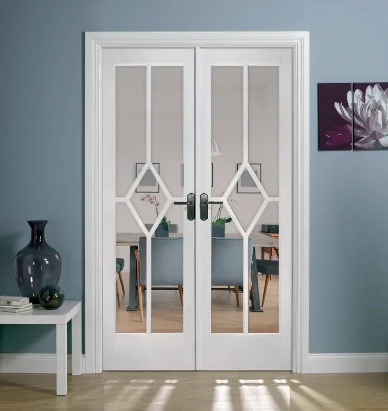 White room divider with glass panels and geometric design in modern living space