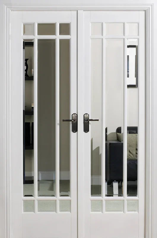 White room divider with glass panels and dual handles separating lounge area
