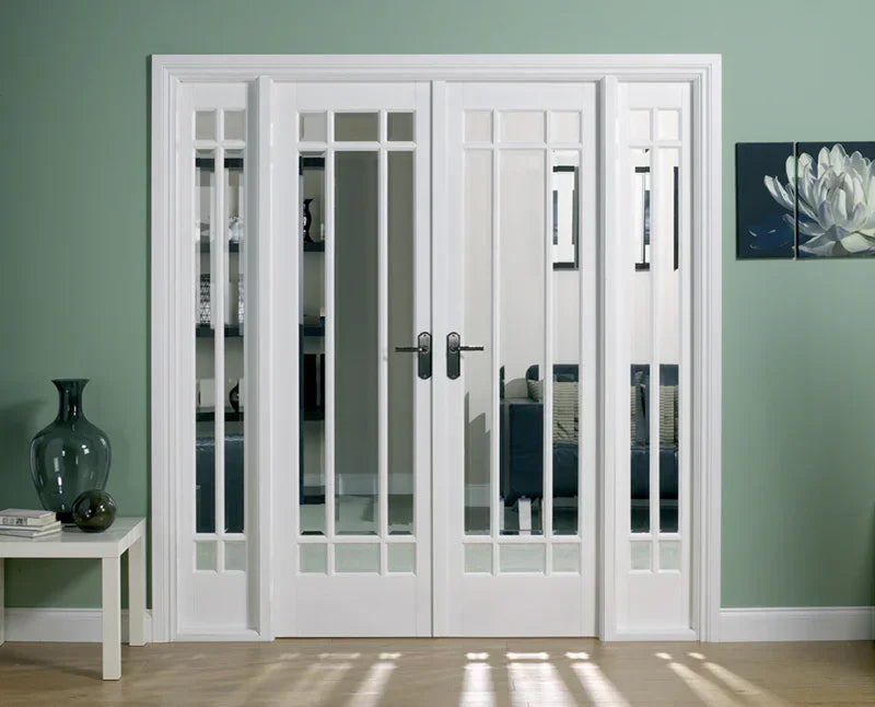 White panelled room divider with glass inserts separating living spaces