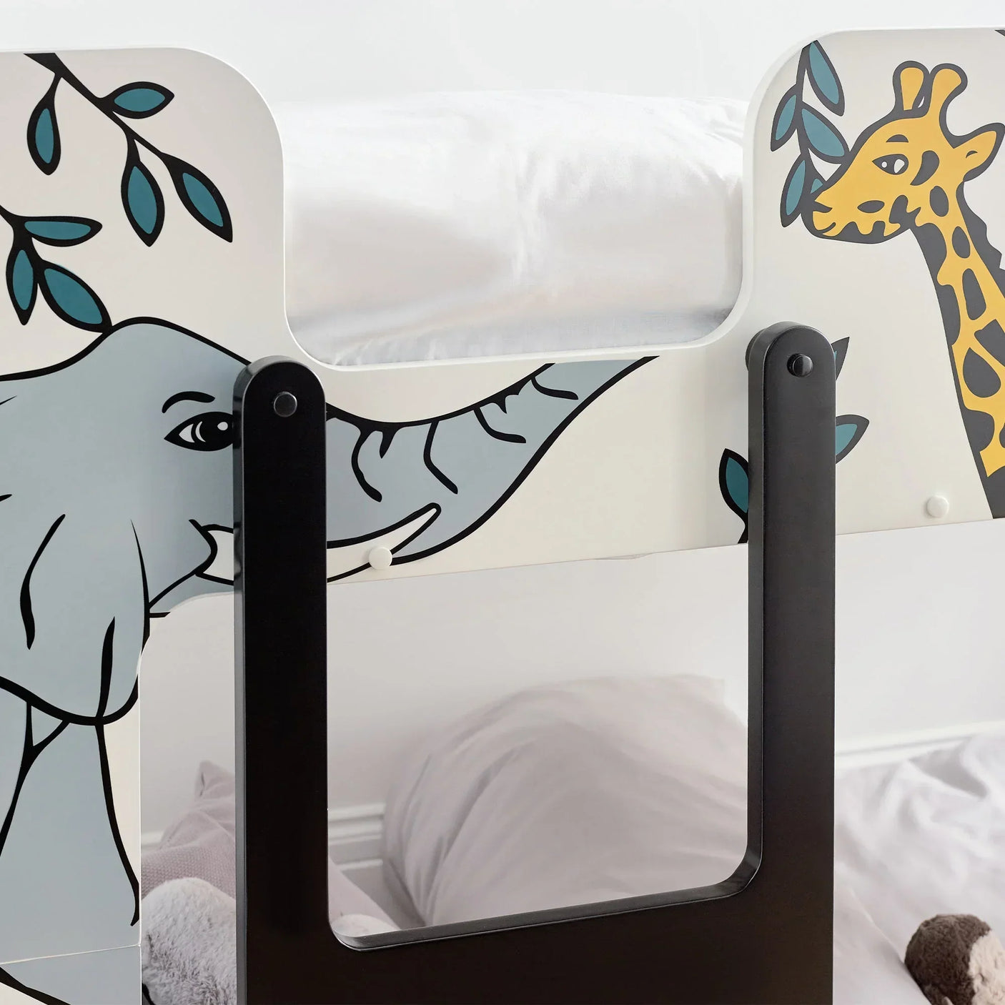 Safari bunk bed with giraffe and elephant illustrations on white safety rail