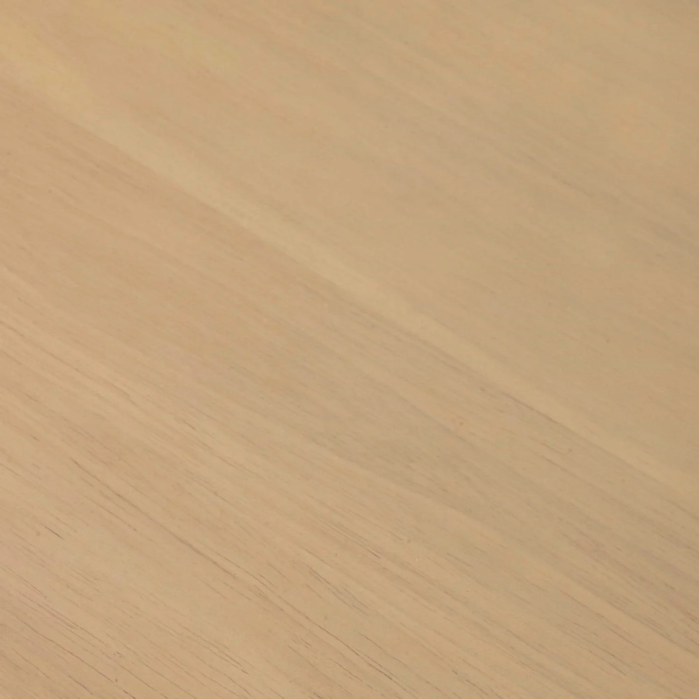 Close up of light wood dining table surface with visible grain pattern