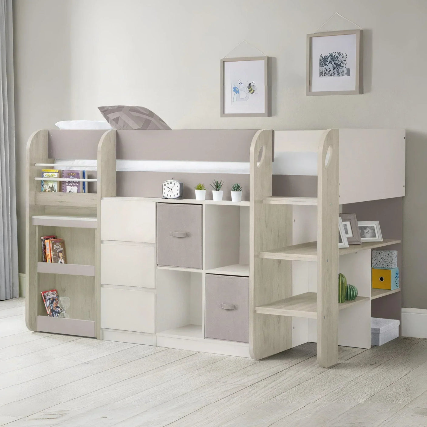 Children’s mid sleeper bed with storage shelves, drawers and grey fabric cubes in bedroom