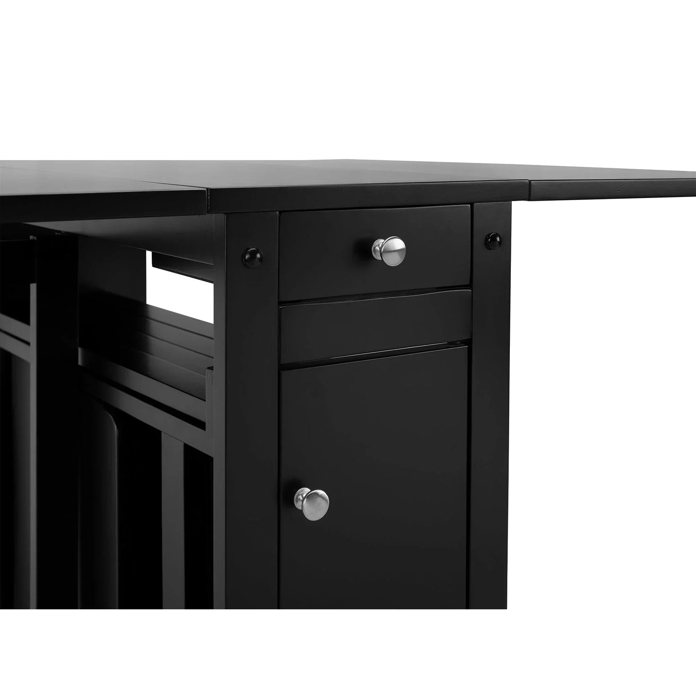 Black dining table with storage drawer and shelf detail, silver handles visible