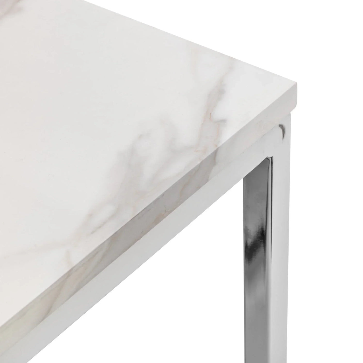 White marble effect table top with chrome metal frame, close-up of corner and leg