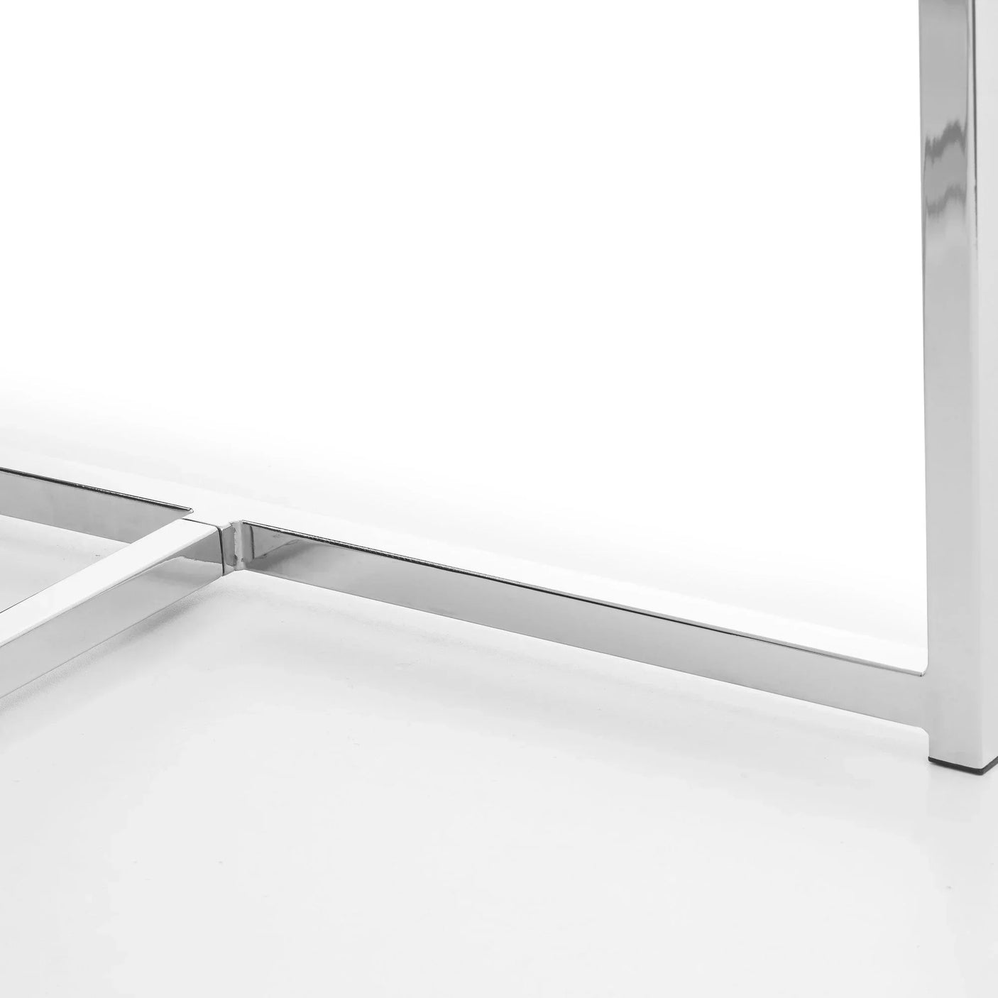 Chrome metal table leg with modern rectangular frame detail on white background