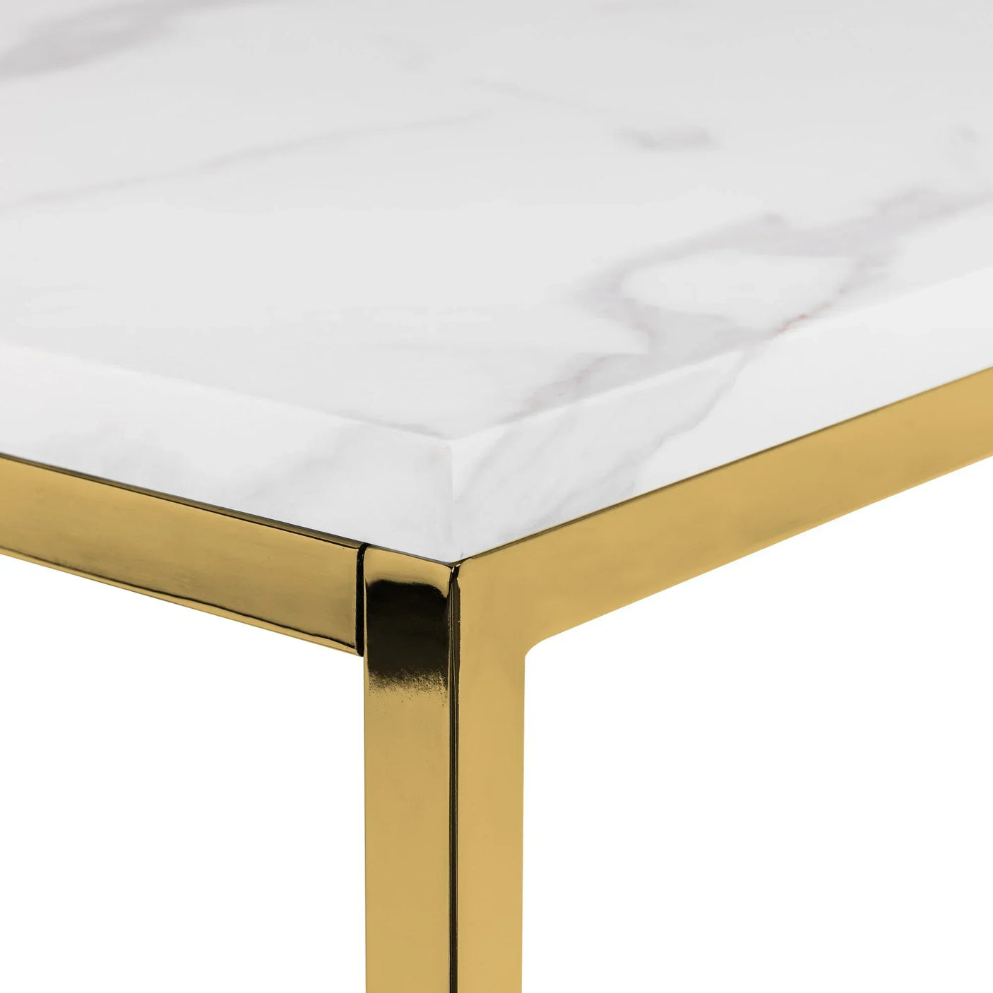 Corner view of marble coffee table with gold metal frame