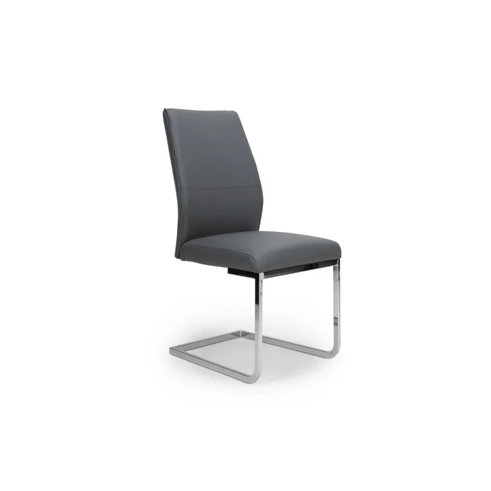 Grey dining chair with chrome cantilever frame and padded seat on white background
