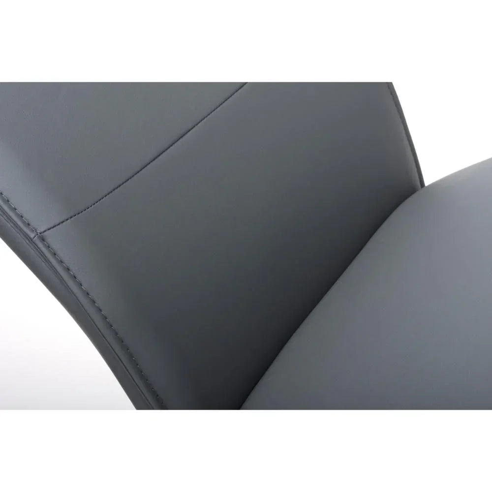 Closeup of grey faux leather dining chair backrest and seat stitching detail