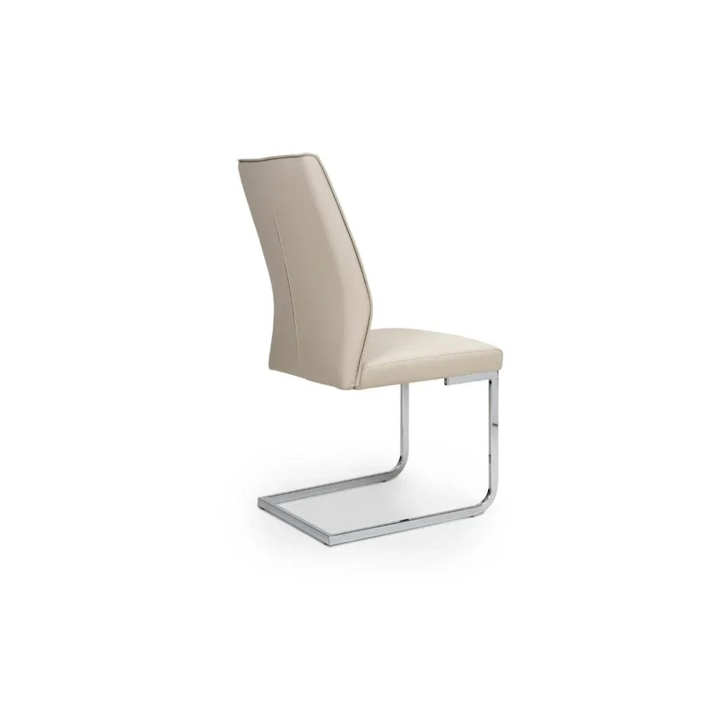 Beige leather dining chair with chrome cantilever base, side view