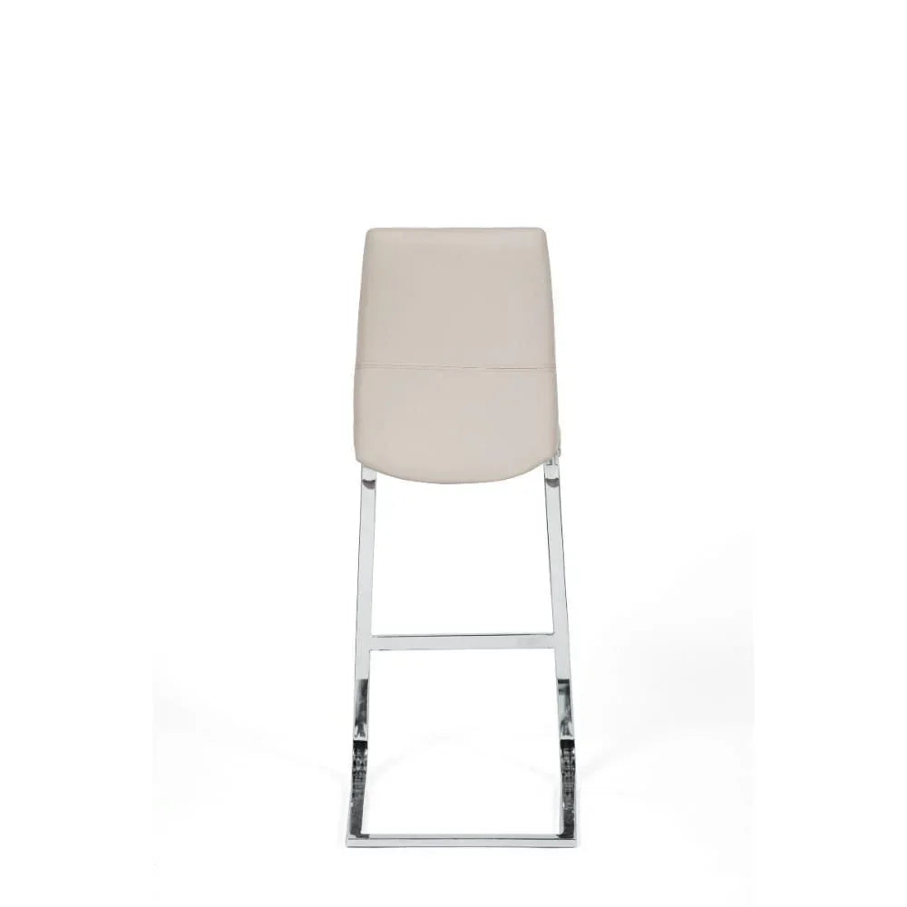 Rear view of cream bar stool with chrome legs on white background