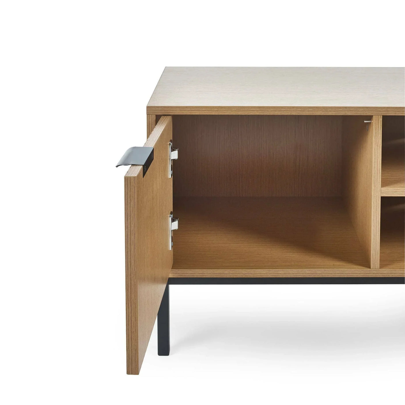 Oak sideboard with open cabinet door and black metal handle