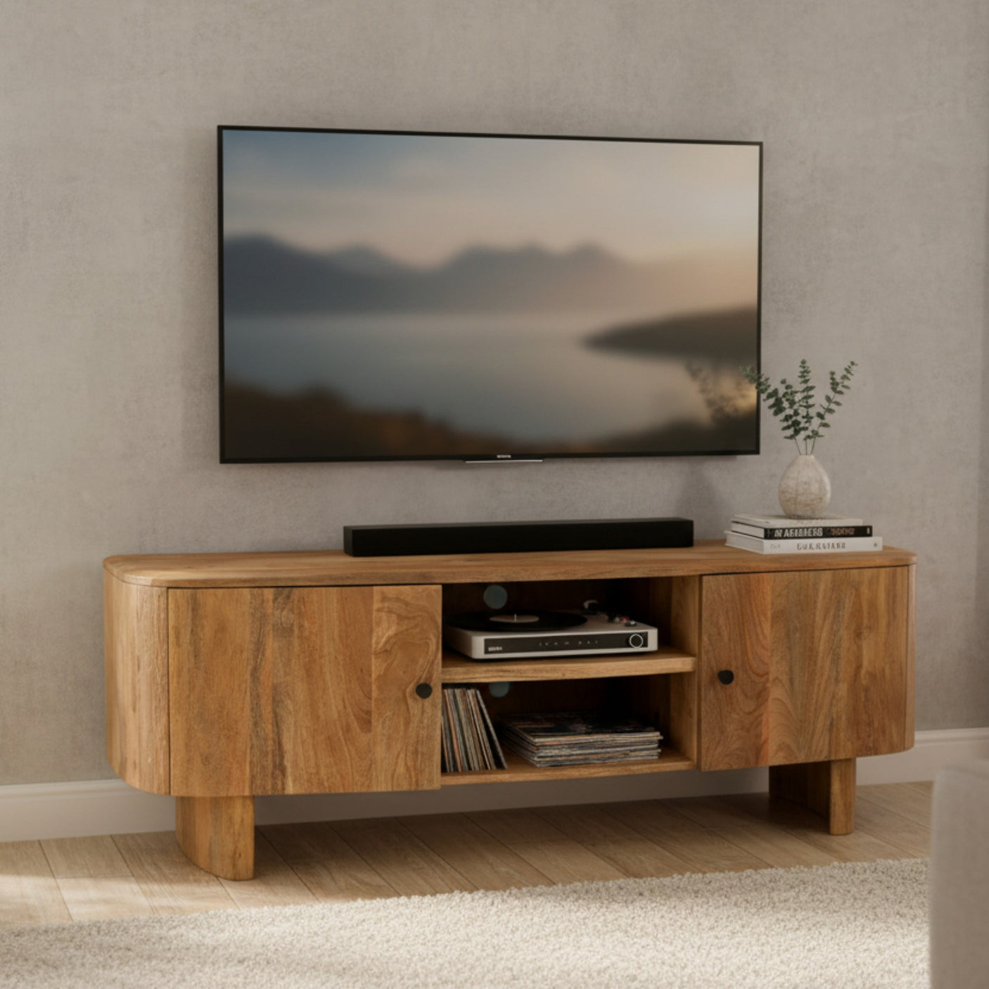 Wooden TV stand with a television displaying a scenic view in a living room.