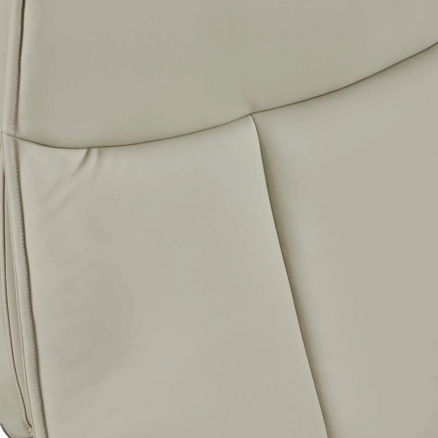 Close-up of beige leather Sofia dual recliner upholstery with stitching detail