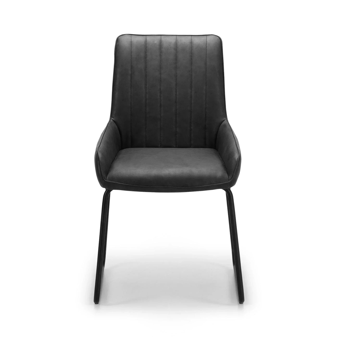 Antique black dining chair with padded seat, metal legs, and vertical stitched detail