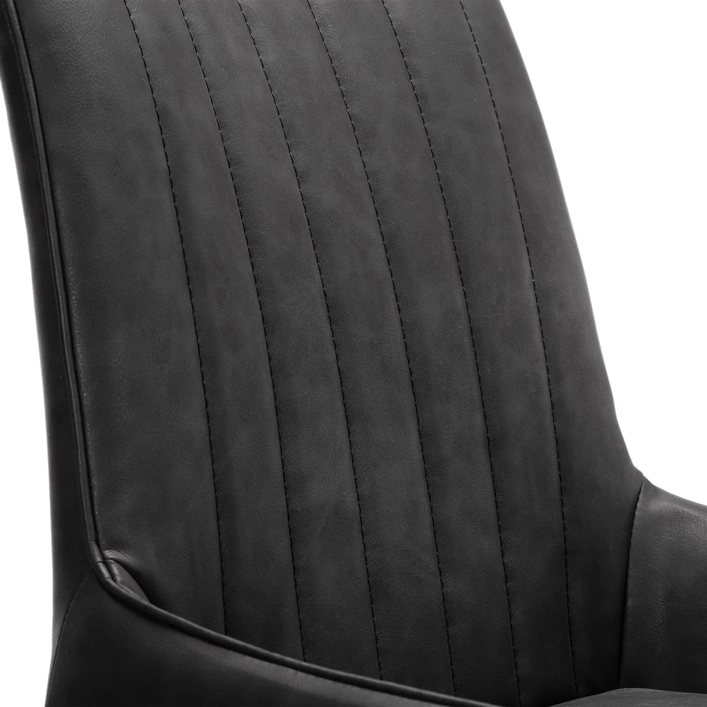 Close-up of Soho dining chair with antique black upholstery and vertical stitching detail
