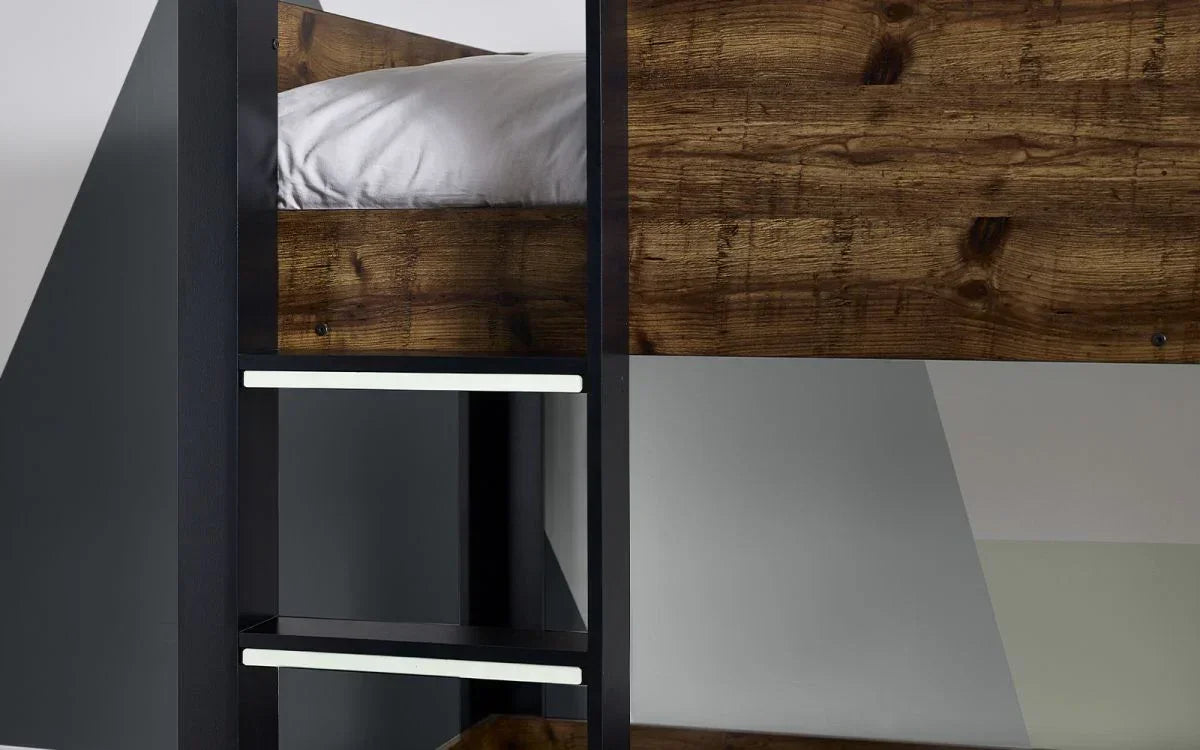 Close up of wood and metal bunk bed ladder with pillow on top bunk